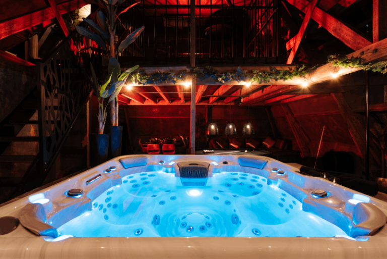 Suite EXTASE – Loft privatif avec jacuzzi XXL et univers sensoriel